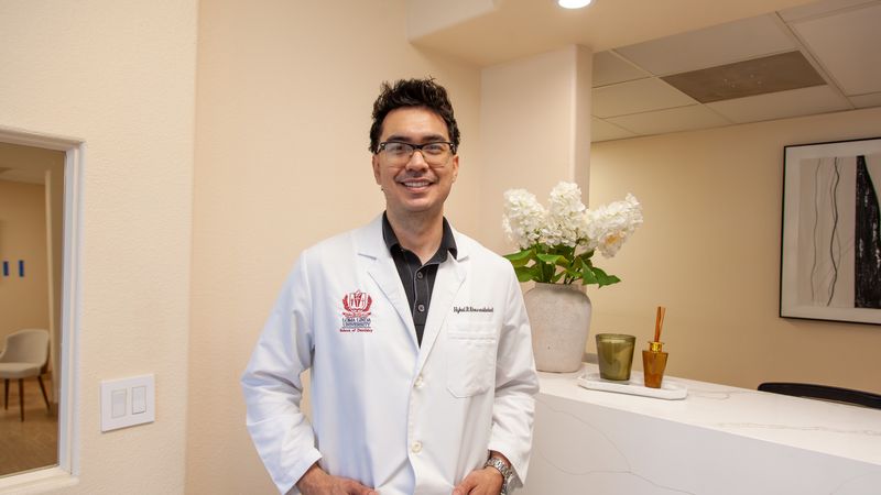 Hykal R. Khosravibabadi, DDS, at the practice&rsquo;s reception.